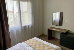 Кровать или кровати в номере Luxury Apt in Mivida Avenue