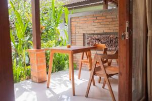 Patio nebo venkovní prostory v ubytování Bramasa Ubud Guest House
