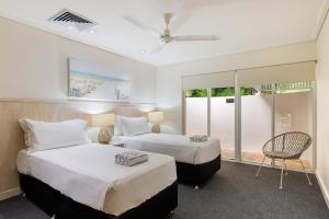 Ένα ή περισσότερα κρεβάτια σε δωμάτιο στο Mirage Resort Villa 420 with access to Sheraton Facilities