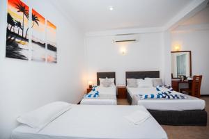 Postel nebo postele na pokoji v ubytování Sole Luna Resort & Spa