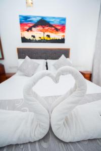Postel nebo postele na pokoji v ubytování Sole Luna Resort & Spa