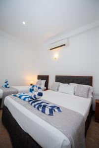 Postel nebo postele na pokoji v ubytování Sole Luna Resort & Spa