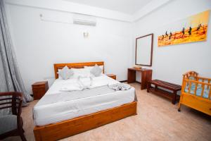Postel nebo postele na pokoji v ubytování Sole Luna Resort & Spa