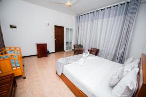 Postel nebo postele na pokoji v ubytování Sole Luna Resort & Spa