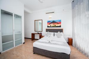 Postel nebo postele na pokoji v ubytování Sole Luna Resort & Spa