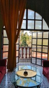 Posezení v ubytování Qila Hotel