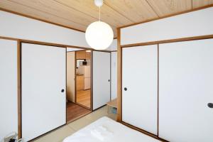 Llit o llits en una habitació de perfect life緑橋