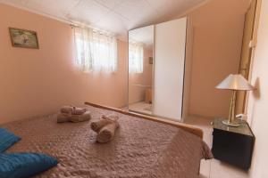 Posteľ alebo postele v izbe v ubytovaní Holiday House Rusticana Sali, Dugi otok near NP Kornati