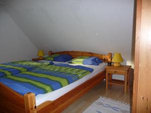 Postel nebo postele na pokoji v ubytování Haus Heverstrom