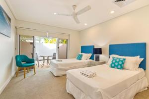 Ένα ή περισσότερα κρεβάτια σε δωμάτιο στο Mirage Resort Villa 446 with access to Sheraton Facilities