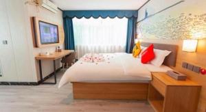 Postel nebo postele na pokoji v ubytování Jun Hotel Sichuan Chengdu South High-Tech Zone Yongfeng Road