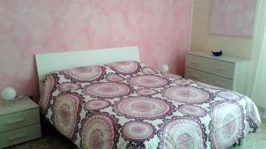 Postel nebo postele na pokoji v ubytování Cristina Apartment
