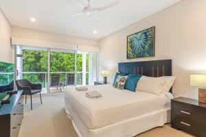 Ένα ή περισσότερα κρεβάτια σε δωμάτιο στο Mirage Resort Villa 454 with access to Sheraton Facilities