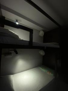 Postel nebo postele na pokoji v ubytování Cozy Inn Hostel