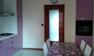 Kuchyň nebo kuchyňský kout v ubytování Cristina Apartment
