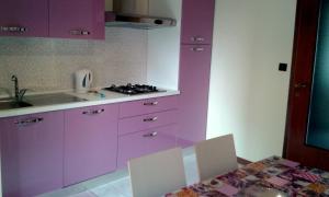 Kuchyň nebo kuchyňský kout v ubytování Cristina Apartment