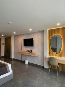 TV a/nebo společenská místnost v ubytování LION 9 HOTEL