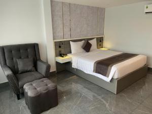 Postel nebo postele na pokoji v ubytování LION 9 HOTEL
