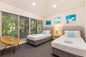 Ένα ή περισσότερα κρεβάτια σε δωμάτιο στο Mirage Resort Villa 418 with access to Sheraton Facilities