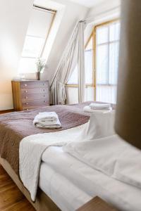 Posteľ alebo postele v izbe v ubytovaní Aparthotel Bellamonte