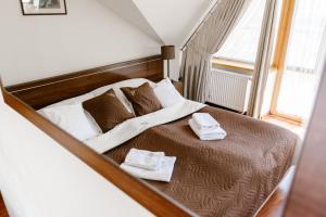 Posteľ alebo postele v izbe v ubytovaní Aparthotel Bellamonte