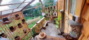 an overhead view of a balcony with potted plants at Wisnu Lumbung Uluwatu in Uluwatu