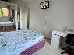Ένα ή περισσότερα κρεβάτια σε δωμάτιο στο Chez Helene