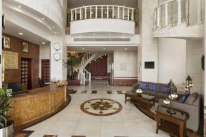A seating area at Ramada by Wyndham Beach Hotel Ajman