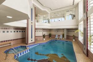 The swimming pool at or close to Ramada by Wyndham Beach Hotel Ajman