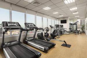The fitness centre and/or fitness facilities at Ramada by Wyndham Beach Hotel Ajman