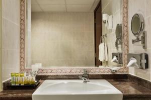 A bathroom at Ramada by Wyndham Beach Hotel Ajman