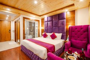 Postel nebo postele na pokoji v ubytování Hotel Snow White Resorts
