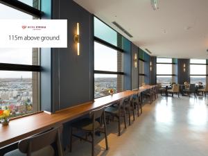 Ein Restaurant oder anderes Speiselokal in der Unterkunft Hotel Emisia Sapporo 