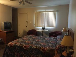 Ένα δωμάτιο στο Hotel Motel Arnold