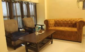 Posezení v ubytování Hotel Kaushambi Grand Near Kaushambi Metro Station