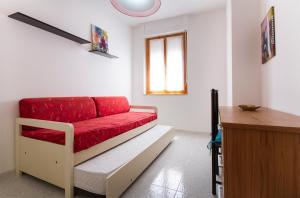 A bed or beds in a room at Casa Baleari 28C