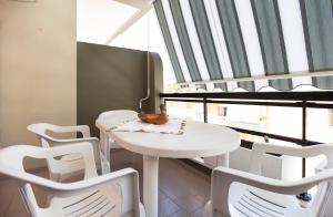 A seating area at Casa Baleari 28C