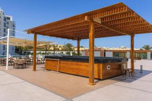 a pavilion with a bar on a patio at Scandic Resort in Hurghada, EGYPT in Hurghada