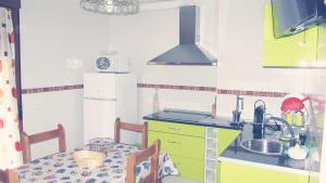 Η κουζίνα ή μικρή κουζίνα στο Apartamentos Turísticos Cabrera