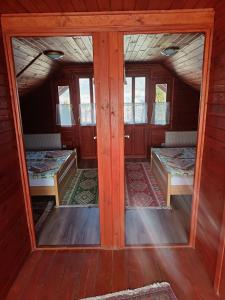 Una cama o camas en una habitación de Casa Sóhegy Praid