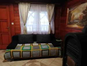 Una cama o camas en una habitación de Casa Sóhegy Praid