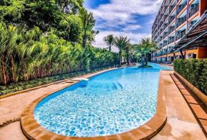 Φωτογραφία από το άλμπουμ του C194 MaiKhao 1BR Condo Poolside Walk 2 Beach σε Ban Bo Sai Klang