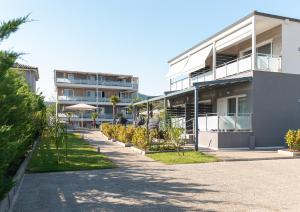 an empty street in front of a building at Astra Sarti Luxury Suites in Sarti