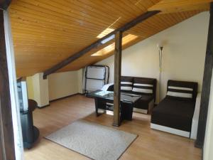 Posezení v ubytování Guest House The House