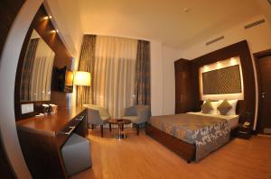 Photo de la galerie de l'établissement Small Beach Hotel, à Turgutreis 21 autres photos