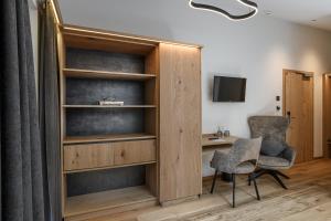 TV a/nebo společenská místnost v ubytování Hotel Hubertushof