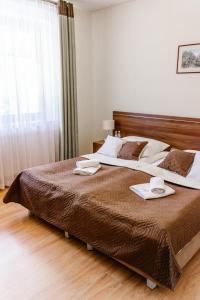 Posteľ alebo postele v izbe v ubytovaní Aparthotel Bellamonte