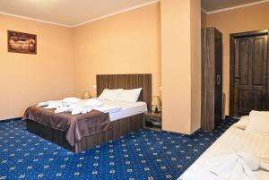 Postel nebo postele na pokoji v ubytování Hotel Aby Baile Felix