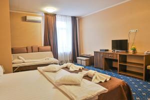 Postel nebo postele na pokoji v ubytování Hotel Aby Baile Felix