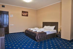 Postel nebo postele na pokoji v ubytování Hotel Aby Baile Felix